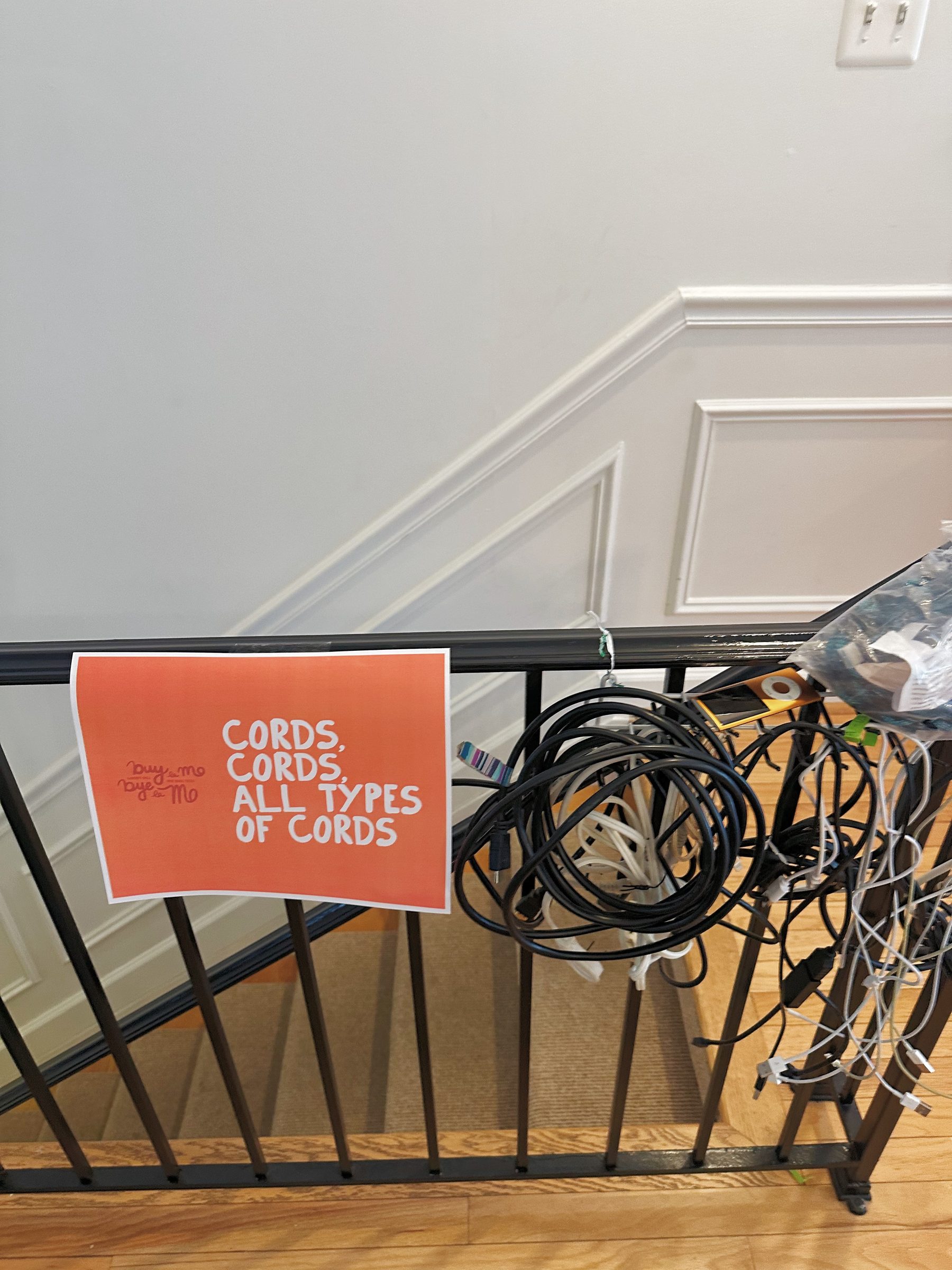 "Cords, cords, all types of cords" category sign