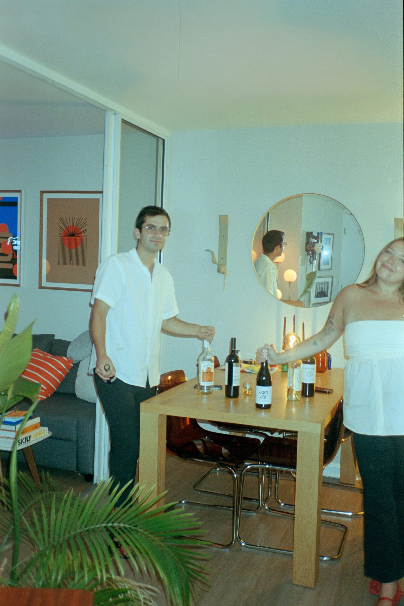 Hosting EMRY Wine Bar, holding the menu card