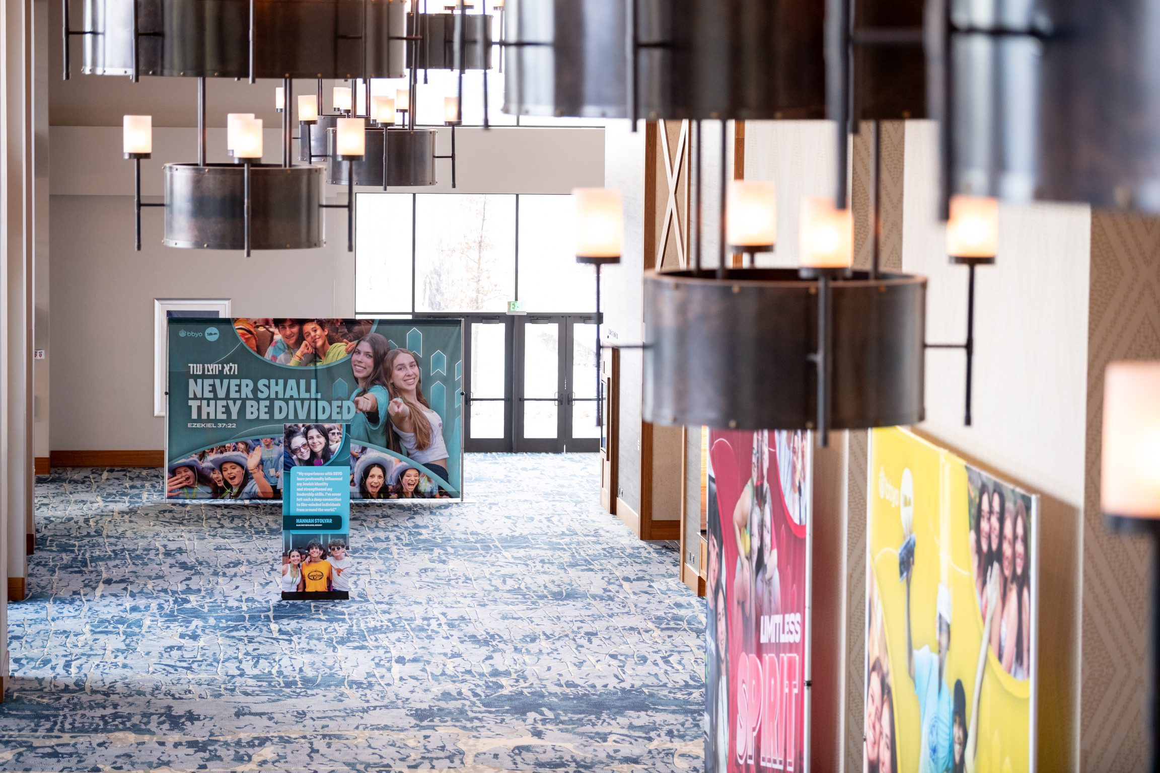 "Never Shall They Be Divided" lobby banner display
